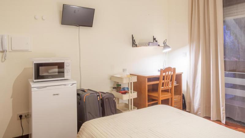 Residencia Laranjeira Hostel Porto Luaran gambar